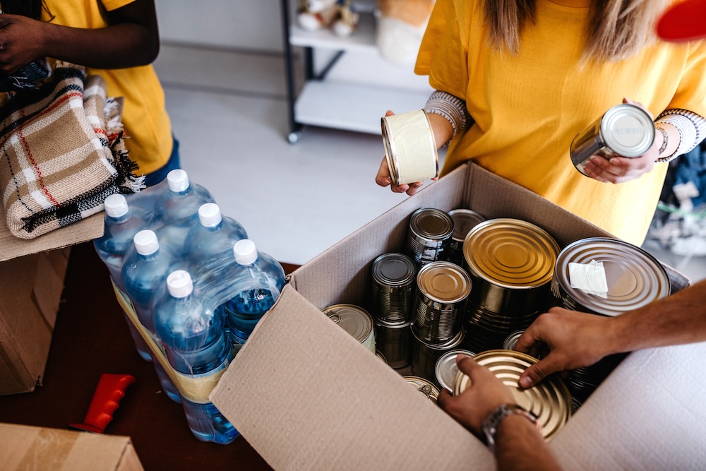 Volunteers organizing donated goods